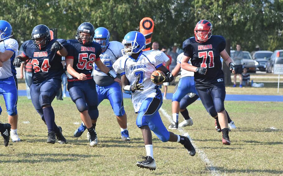 Rota's LJ Chester carries the ball on an end around in the Admirals' 22-14 loss to Aviano on Saturday, Sept. 29, 2018.