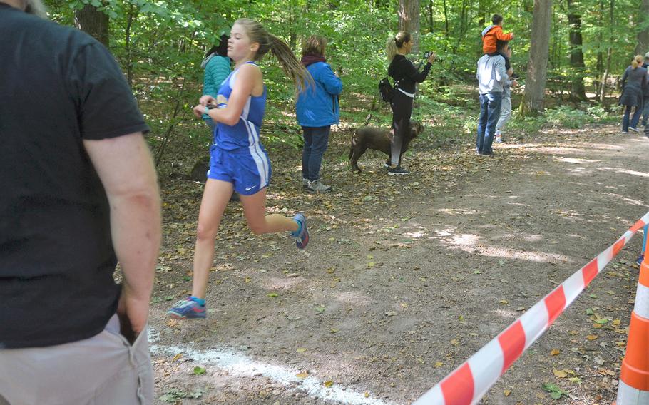Greta Lambert, a Wiesbaden sophomore, crosses the finish line in first at a meet on Saturday, Sept. 29, 2018.