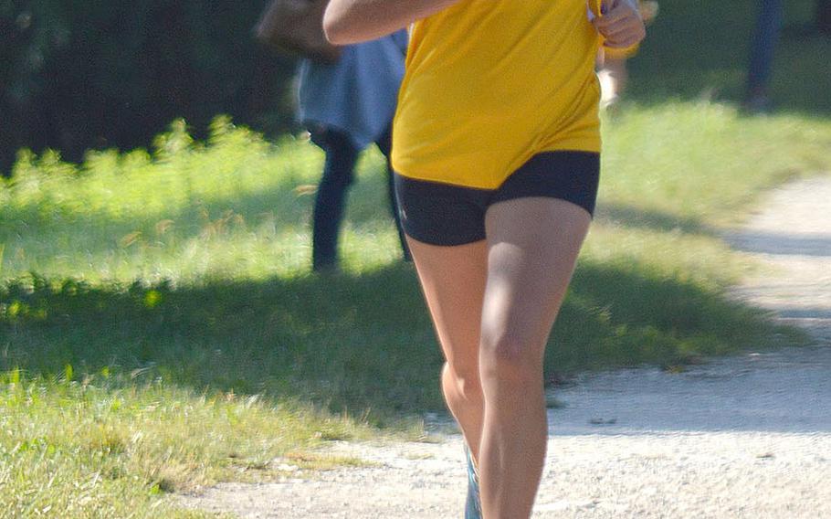 Olivia Martel, a sophomore at Vicenza, crosses the finish line at a 5-kilometer race that took place at Lago Di Fimon, Vicenza, Italy, on Saturday, Sept. 29. She finished in second with a time of 21 minutes and 37 seconds - 1 and a half minutes faster than her last best finish.