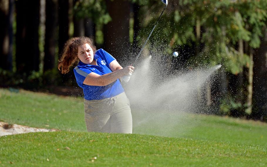 Ramstein's Lauren Sutherland hits out of a bunker  on the first day of competition at the DODEA-Europe golf championships at Rheinblick golf course in Wiesbaden, Germany, Wednesday, Oct. 10, 2018.





