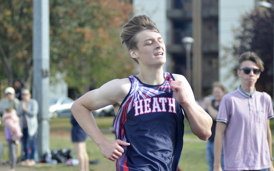 Lakenheath's Sean Marts strides towards the finish of a 5-kilometer race during a high school cross country meet at RAF Lakenheath, England, Saturday, Oct. 13, 2018. Marts earned third place with a time of 18 minutes and 13 seconds.