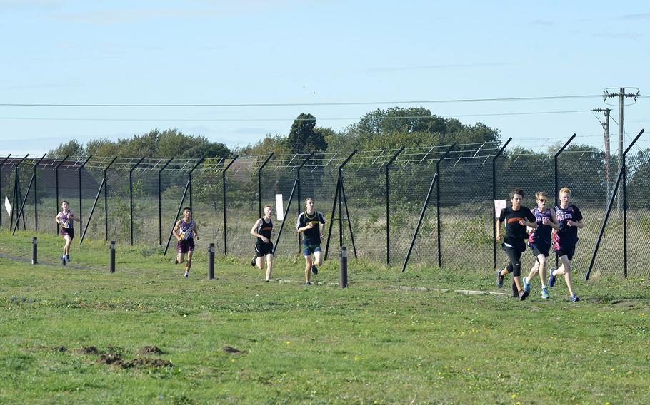 High school boys cross country athletes from Lakenheath, Alconbury, Vilseck and Spangdahlem running the first lap of a 5-kilometer race at RAF Lakenheath, England, Saturday, Oct. 13, 2018. The boys top three finishers were Matthew Cavanaugh at 17 minutes, 48 seconds, Johnathan Alvarado at 18:02 and Sean marts at 18:13.
