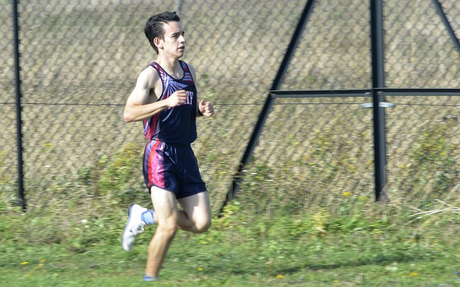 Lakenheath's Matthew Cavanaugh leads the first lap of a 5-kilometer race during a high school cross country meet at RAF Lakenheath, England, Saturday, Oct. 13, 2018. Cavanaugh finished first with a time of 17 minutes and 48 seconds.