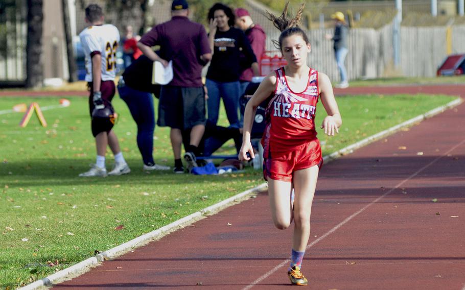 Lakenheath cross country runner Hollie Myers sprints to finish during a 5-kilometer race at RAF Lakenheath, England, Saturday, October 13, 2018. Myers finished first with a time of 21 minutes and 34 seconds. 
