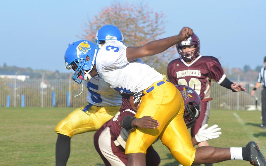 Ogden Andrew, the breakout star of Division III six-man football this season for Ansbach, is tackled by the defensive line of the Baumholder Buccaneers during the Bucs final game of the season in Baumholder, Germany, Friday, Oct. 19, 2018.