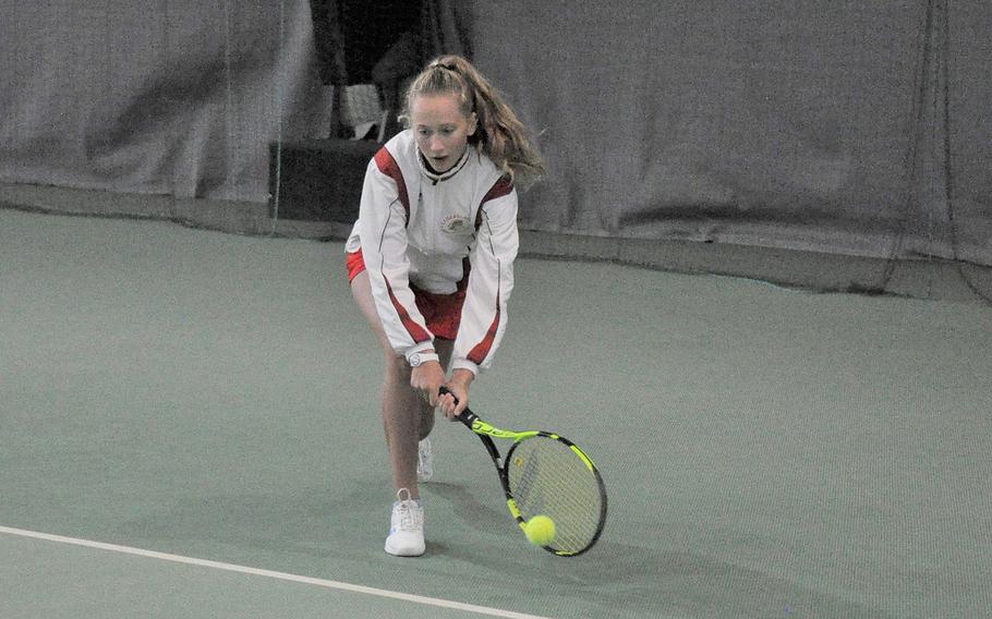 Kaiserslautern freshman Aiva Schmitz reaches for a ball before a preliminary match in the 2018 DODEA-Europe girls singles tennis tournament Thursday at Vitis Tennis Center in Wiesbaden, Germany. Schmitz won all three of her matches on the day. 
