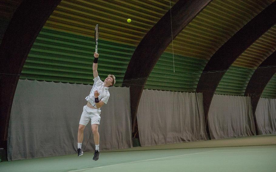 Noah Banken serves during the semifinals of the DODEA-Europe tennis championships in Wiesbaden, Germany, Friday, Oct. 26, 2018.