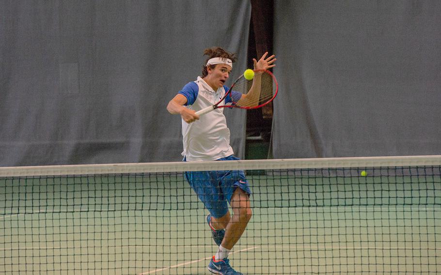 Mathias Mingazzini charges the net during the semifinals of the DODEA-Europe tennis championships in Wiesbaden, Germany, Friday, Oct. 26, 2018.