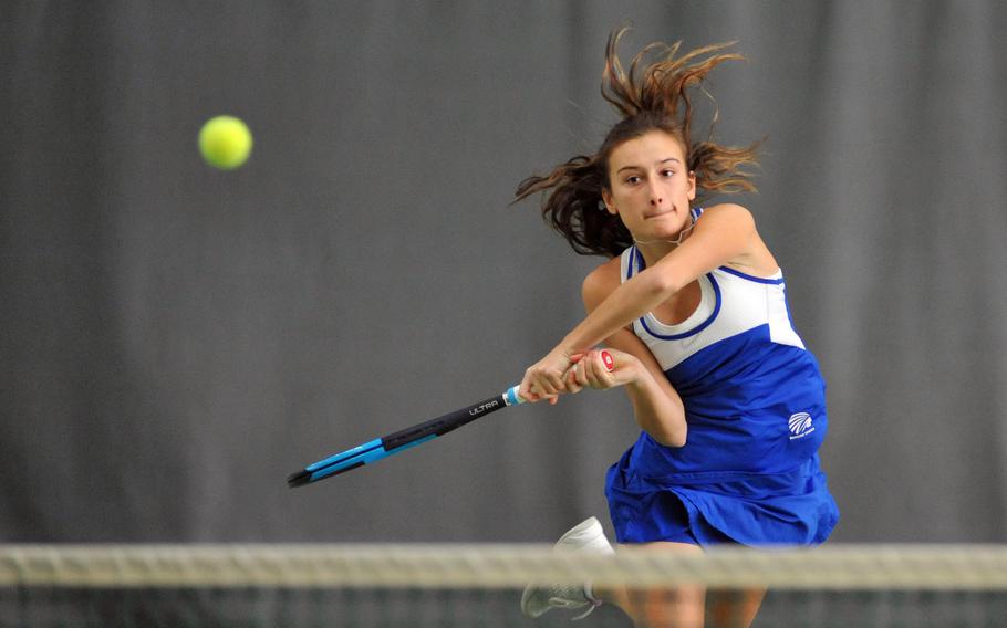 Charlotte Kordonowy slams back a shot against Kaiserslautern's Aiva Schmitz in in the girls final at the DODEA-Europe tennis championships in Wiesbaden, Germany, Saturday, Oct. 27, 2018. Schmitz won 7-5, 6-1.