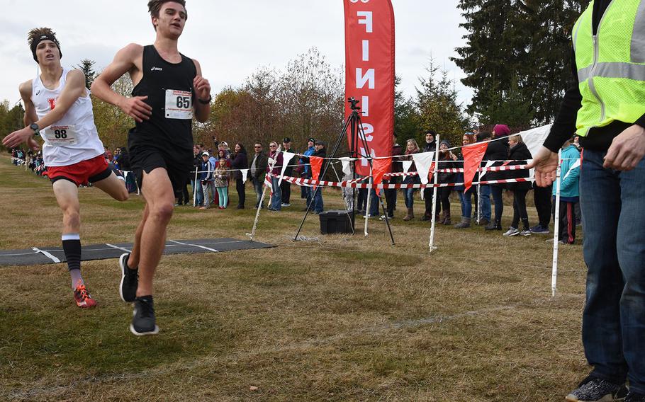 Stuttgart's Landon McMinimy and Kaiserslautern's Joseph Purvis finished almost neck-and-neck at the 2018 DODEA-Europe cross championships on Saturday, Oct. 27, 2018, at  Baumholder, Germany. McMinimy's third-place finish helped Stuttgart finish second in the boys' Division I race.
