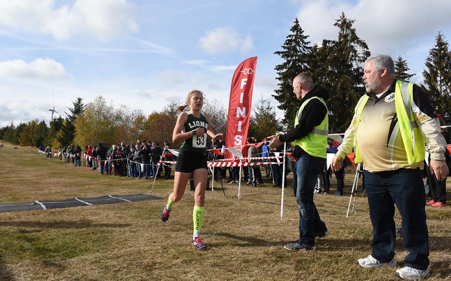 St. John's Abigail Michalec crossed the finish line in first in the girls' race at the 2018 DODEA-Europe cross country championships on Saturday, Oct. 27, 2018, at Baumholder, Germany.
