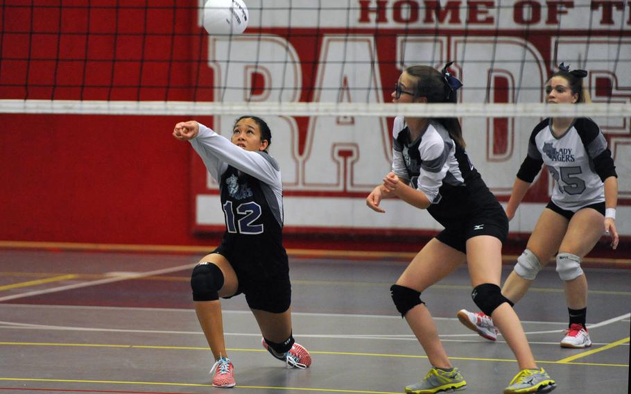 Calantha Remy of Hohenfels receives a Sigonella serve as teammates Elyse Doyle, center, and Nicole Serrano watch. The Tigers lost to Sigonella 25-13, 25-17, 25-5 in a Division III match at the DODEA-Europe volleyball finals in Kaiserslautern, Germany, Thursday, Nov. 1, 2018. 





