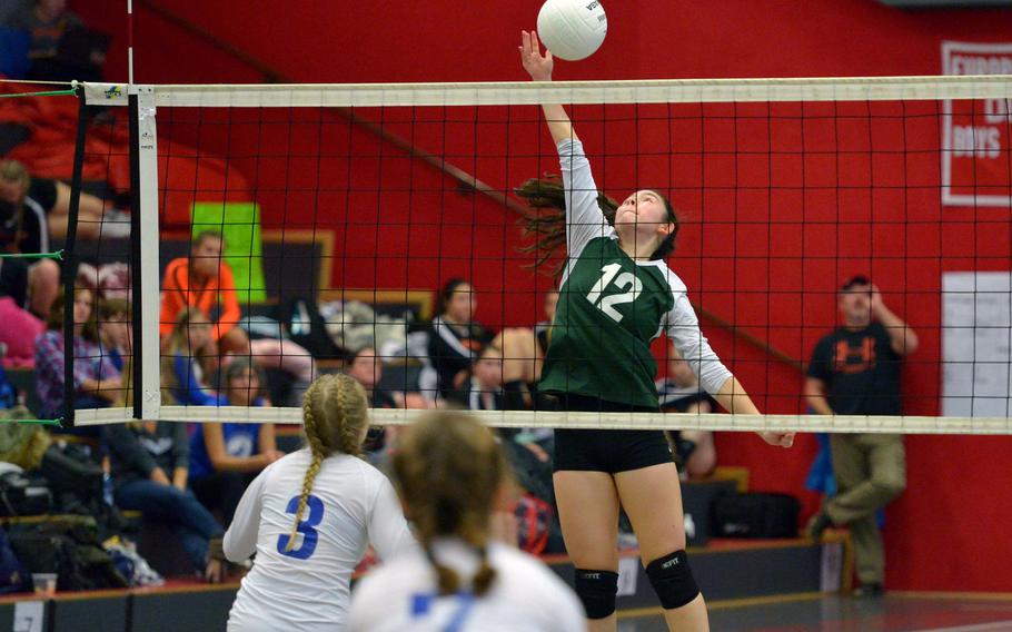Alconbury's Anna Downing goes high at the net in the Dragons' 17-25, 25-20, 25-22,26-24 loss to Brussels in a Division III semifinal at the DODEA-Europe volleyball finals in Kaiserslautern, Germany, Friday, Nov. 2, 2018.





