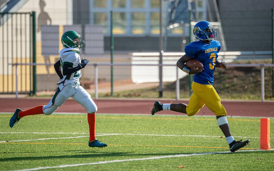 Ogden Andrew from Ansbach in scores during the DODEA-Europe Division III football championship game between the Ansbach Cougars and AFNORTH Lions, Saturday, Nov. 3, 2018. 