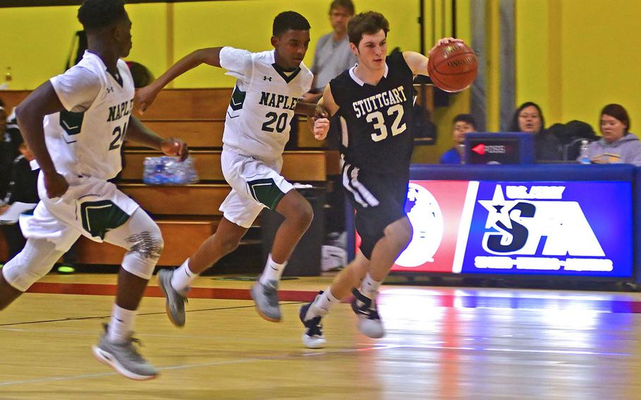 Stuttgart's Logan Crouch tries to beat Naples' Biniam Stefanos and Ashton Jeanty, left, down the court on Friday in the Wildcats' 46-44 victory.