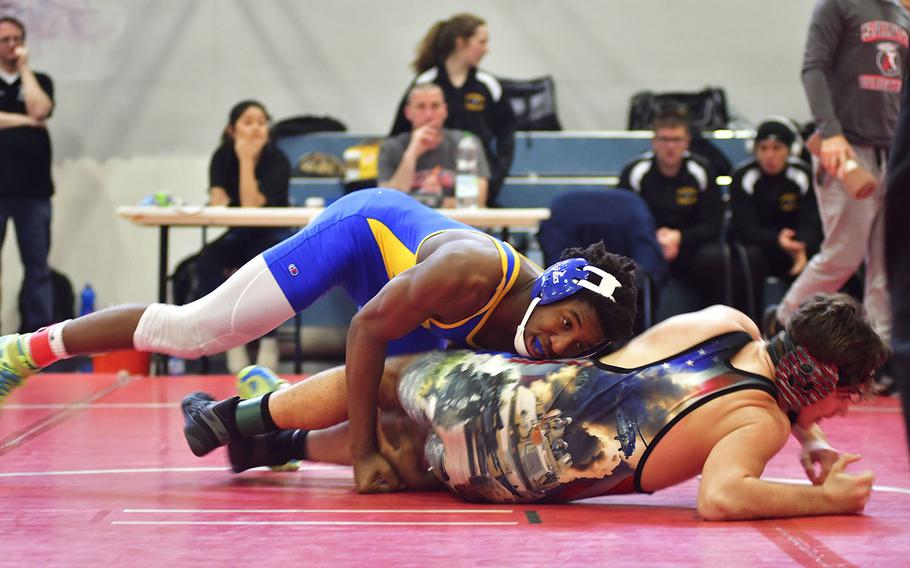 Amari Pyatt, a junior from Sigonella, wrestles Matthew Hanford-Garcia from Naples during Saturday’s wrestling tournament held at Aviano Air Base. Pyatt is a recent transfer to Sigonella and is originally from Belleview, Neb. Before transferring to Italy, Pyatt was ranked sixth amongst all Nebraska’s high school wrestlers.  He wrestled in the 170-pound bracket at this tournament.  