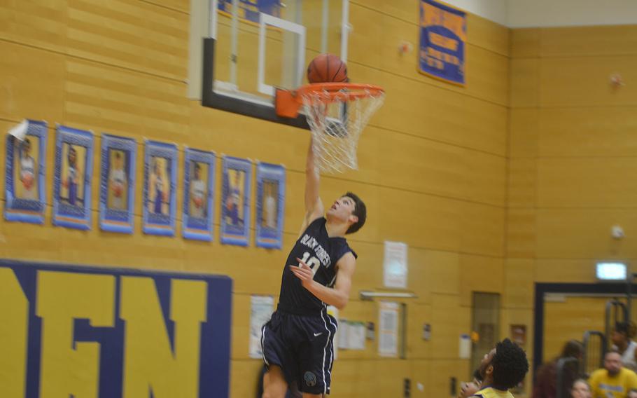 Ethan Powell, a senior with Black Forest Academy, attempts to score a layup during a game against Wiesbaden, in Wiesbaden, Germany, on Friday, Jan. 18, 2019.