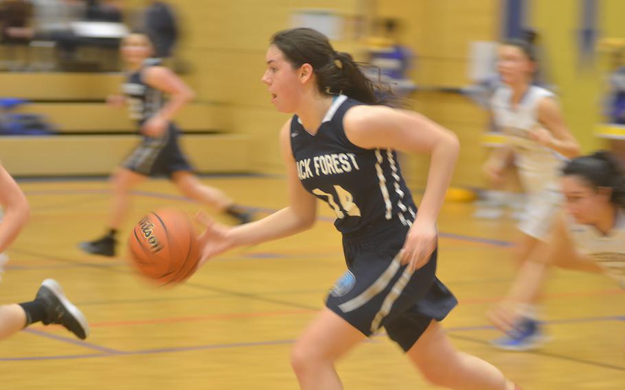 Black Forest senior Kennedy Wilbanks pushes the ball down the court during a game against Wiesbaden on Friday, Jan.18, 2019.