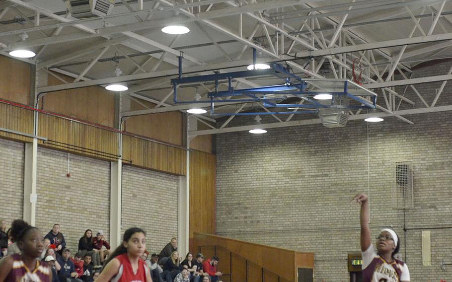 Baumholder point guard Jasmine Dorsey shoots a free throw shot a high school varsity basketball game hosted by the Lancers at RAF Lakenheath, England, Saturday, January 26, 2019. The Buccaneers earned a total of six points from the free throw line.