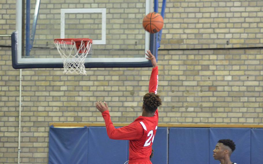 Lakenheath's Maurice Thomas scores an easy shot against Baumholder during a high school varsity basketball game at RAF Lakenheath, England, Saturday, January 26, 2019. Thomas earned 10 points in the 55-32 victory over Baumholder.