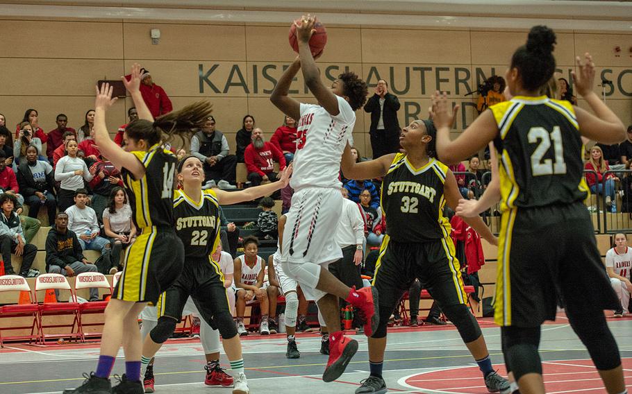 Le'jhanique Brown takes a shot during a varsity basketball game between Stuttgart and Kaiserslautern at Kaiserslautern High School, Germany, Friday, Feb. 8, 2019. Stuttgart won the game in overtime 45-44.