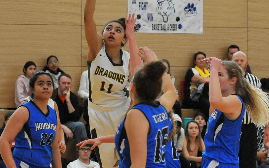 Alconbury' Kira Thorne scores with a jumper against Hohenfels in a Division III game at the DODEA-Europe basketball finals. Alconbury won 45-29.





