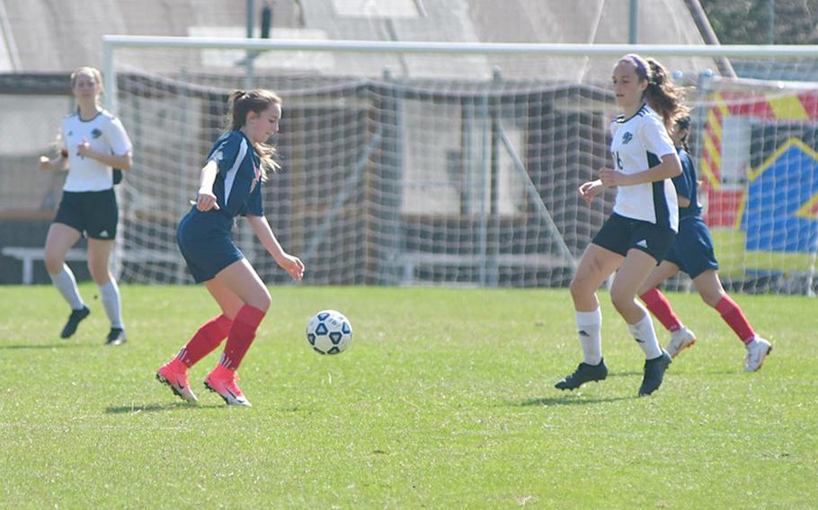 Syrin Whitcomb of Aviano tries to break through the Stuttgart defense during Saturday's game in which Aviano lost 7-0 to Stuttgart. 