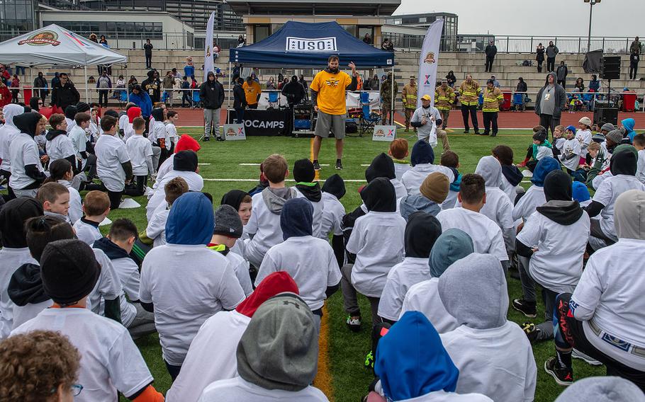 Pittsburg Steelers offensive lineman Alejandro Villanueva talks to kids before a pro camp at Kaiserslautern High School football field Saturday, April 13, 2019. More than 200 kids from around Germany attended the two-day football camp.