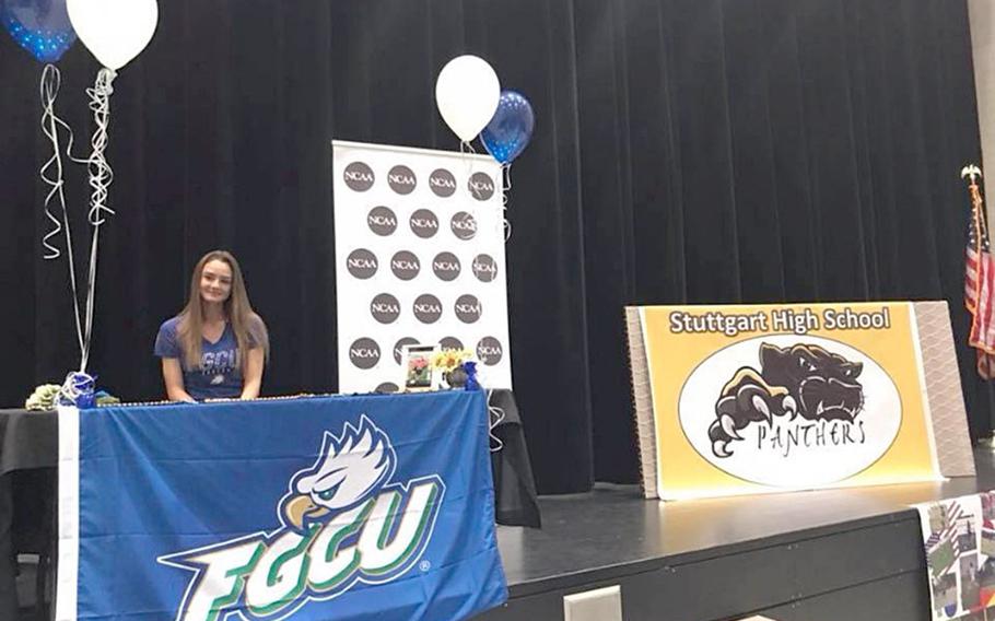 Stuttgart senior Lilly Lakich celebrates signing her National Letter of Intent to play soccer at NCAA Division I program Florida Gulf Coast University at a signing ceremony at Stuttgart High School.