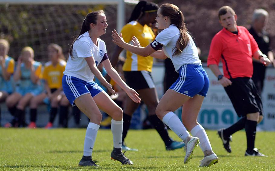 Wiesbaden's Audrey Mehar, right, celebrates with teammate Erin Goodman after scoring the winning 2-1 goal in overtime in a Division I semifinal at Reichenbach, Wednesday, May 22, 2019. Wiesbaden will face Naples in Thursday's final.
