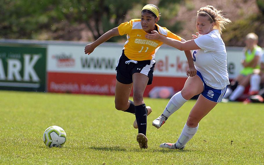 Stuttgart's Victoria Antoine tries to get away from Wiesbaden's Lindsey Barker in a Division I semifinal at Reichenbach, Wednesday, May 22, 2019. Wiesbaden won 2-1 in overtime and will face Naples in Thursday's final.