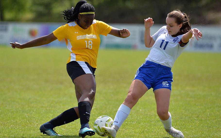 Stuttgart's Skye DaSilva-Mathis and Wiesbaden's Audrey Merhar battle for the ball in a Division I semifinal at Reichenbach, Wednesday, May 22, 2019. Wiesbaden won 2-1 in overtime and will face Naples in Thursday's final.








