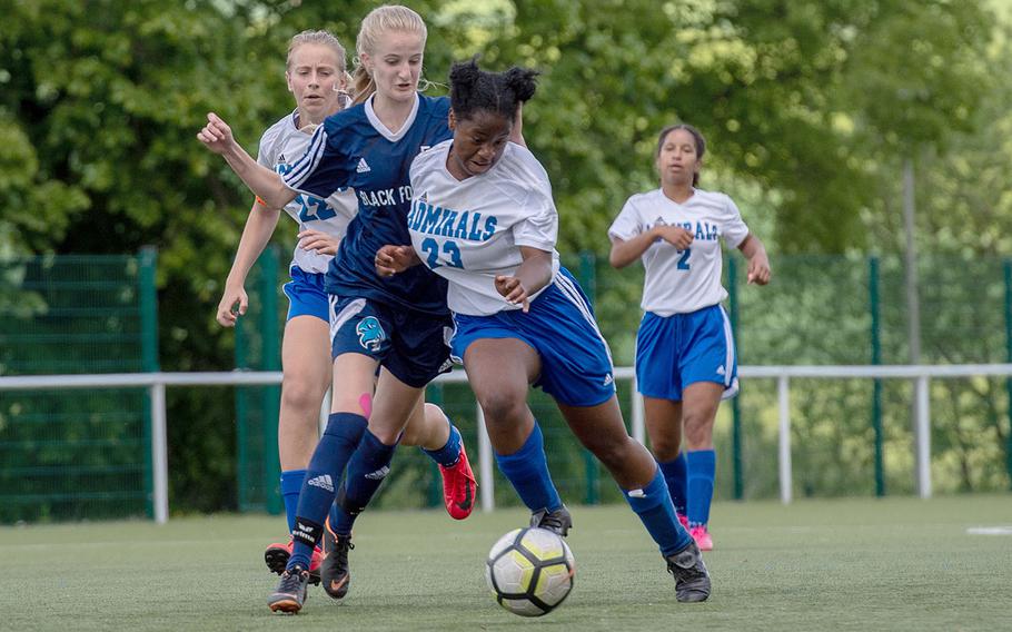 Rota's Nina Burt takes the ball from BFA's Amanda Van Zomereren during a Division II semifinal game on the third day of the DODEA-Europe soccer championships, Wednesday, May 22, 2019.