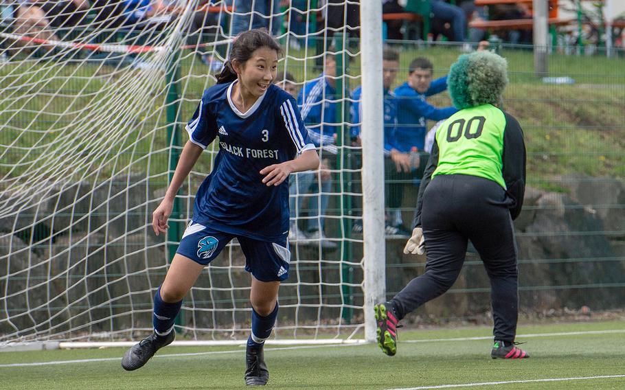 BFA's Yewon Park smiles after scoring a goal against Rota during a Division II semifinal game on the third day of the DODEA-Europe soccer championships, Wednesday, May 22, 2019.