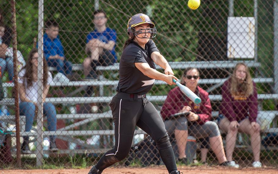 A Vilseck player hits a fly ball during a game against Stuttgart on Day 2 of the girls Division I DODEA-Europe softball championships, Friday, May 24, 2019. 