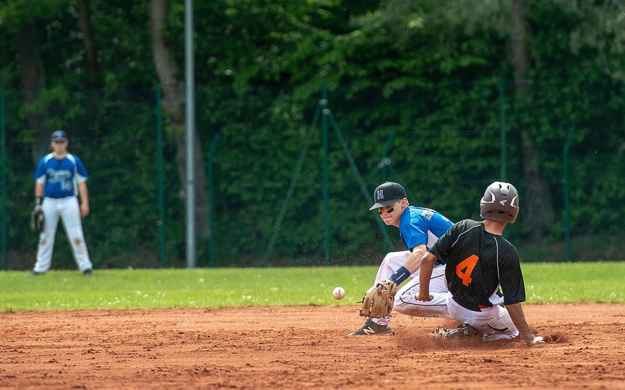 Spangdahlem's Carson Hicks steals second base during a game against Hohenfels on Day 2 of the boys Division II/III DODEA-Europe baseball championships, Friday, May 24, 2019. 