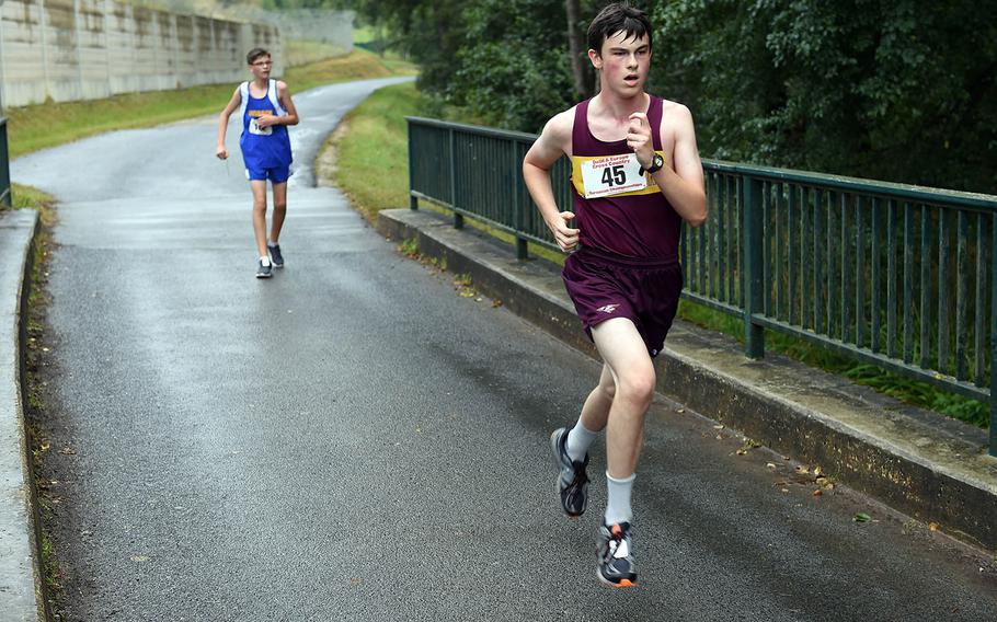 Vilseck's Patrick McDufee finishes the cross country race at Vilseck, Germany, Saturday, Sept. 7, 2019. 
