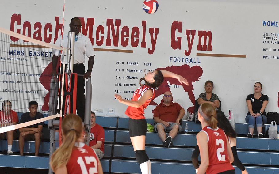 American Overseas School of Rome's Sophia Notalianni goes up for a spike in a match against Rota on Saturday, Sept. 14, 2019.