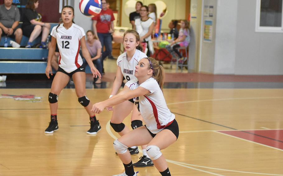 Aviano's Ashley Woodruff gets set for a pass in the Saints' three-set victory over Rota on Saturday, Sept. 14, 2019.