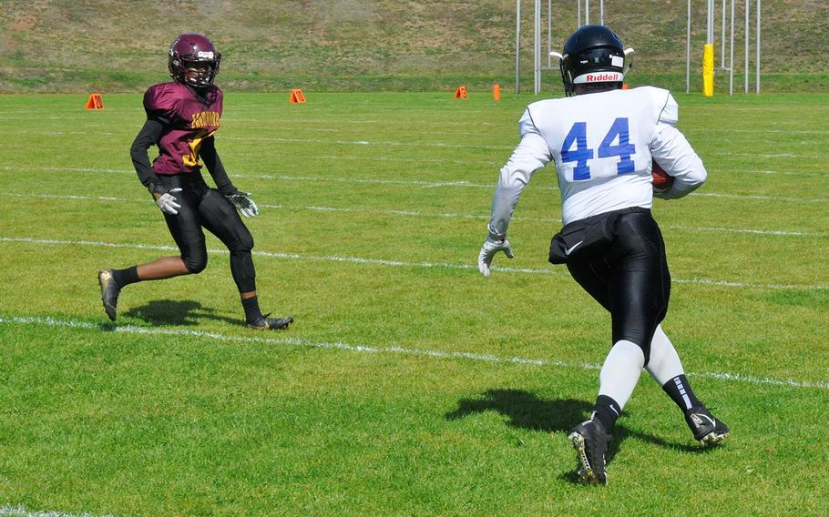 Hohenfels runner Liam Lankford sizes up the Baumholder defense in his team's 21-12 victory  Saturday, Sept. 14, 2019, at Baumholder, Germany. 
