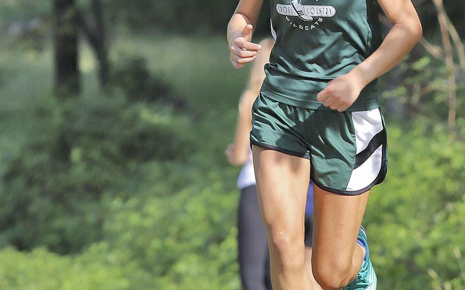 Ariana Coats of Naples High School approaches the finish line during the cross country meet held at San Floriano Parco Rurale, Polcenigo, Italy, Saturday, Sept. 14, 2019. Coats finished in first place with a time  of 20:38 and that was plenty good to break the old course record of 21:50. 