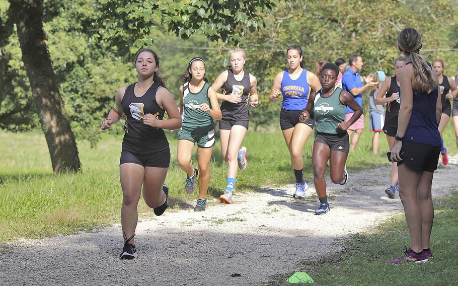 Girls from five Department of Defense Education Activity schools take off during the beginning of the cross country meet held at San Floriano Parco Rurale's running course, Polcenigo, Italy, Sept. 14, 2019. A total of 33 girls started the race but only 30 finished due to some of them sustaining ankle injuries during the race.  