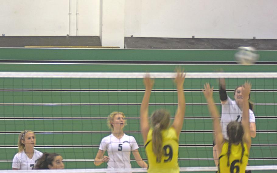 Naples Wildcat Alexia Vancil goes for a kill as Vicenza Cougars defend the net during a competitive matchup between the two teams Saturday Sept. 14, 2019, at Naples Middle High School. The Wildcats beat the Cougars in five sets to offset their four-set loss on Friday to the Cougars. 