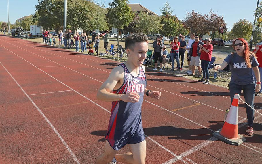 Matt Cavanaugh crosses the finish line at 18 minutes, 16 seconds during the cross country race at RAF Lakenheath on Saturday, Sept, 21, 2019. 
