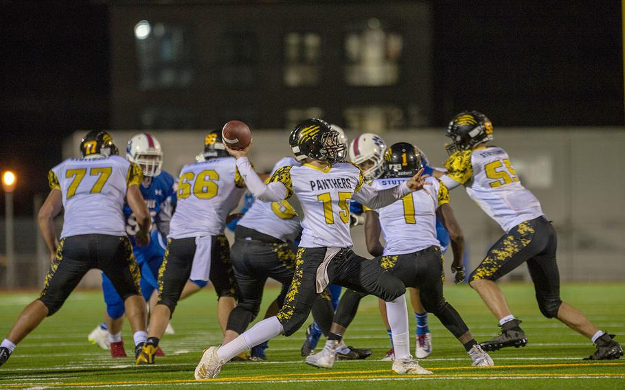 Alec Enfield throws a pass during a game between Ramstein and Stuttgart at Ramstein High School, Friday,  Sept.  27, 2019. Stuttgart won the game 37-17.