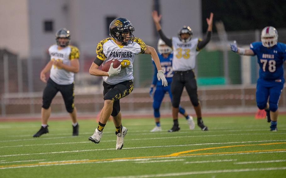 Jacob Ratcliff breaks into the open field to score Stuttgart's first touchdown during a game between Ramstein and Stuttgart at Ramstein High School, Friday, Sept.  27, 2019. Stuttgart won the game 37-17.