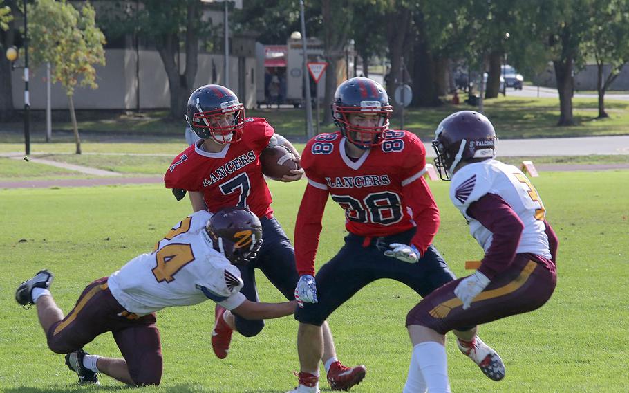 Lakenheath's Ayden Davila runs the ball close enough to the goal for the Lancers to score on the next play, bringing the score to 25-0 at RAF Lakenheath on Saturday, Sept 29, 2019.