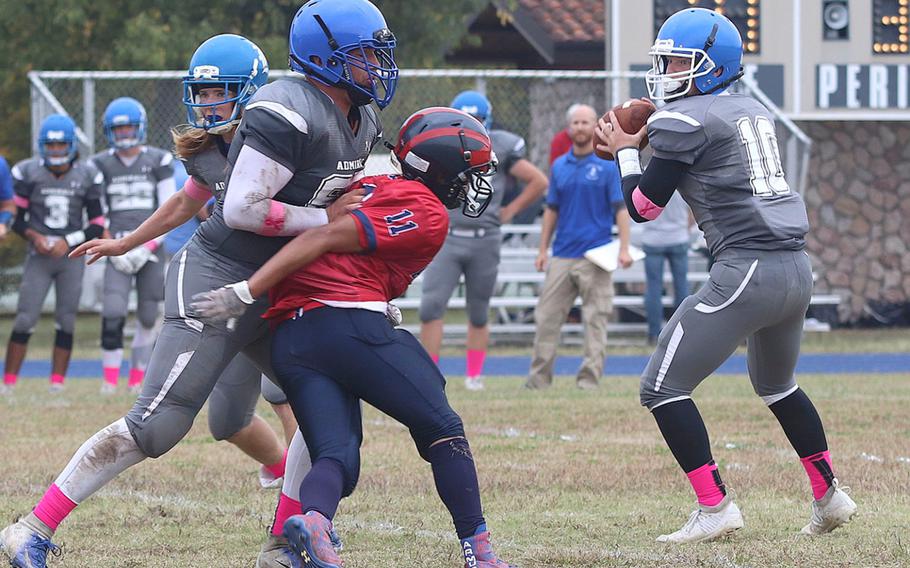 Rota admirals quarterback Campbell Lamb drops back for a pass during Saturday's game held at Aviano where the Aviano Saints edged out Rota 24-21. Aviano will host either SHAPE or Naples in next week's semi-final game.