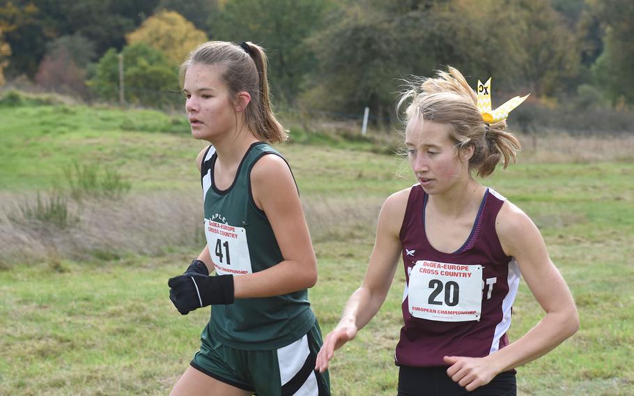Naples' Ariana Coats and Frankfurt's Gracie Welti battled it out at the DODEA-Europe cross country championships in Baumholder, Germany, on Saturday, Oct. 19, 2019. Coats finished fourth and Welti was 