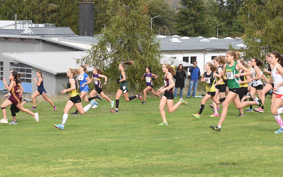 Runners vie for early position at the start of the girls race at the DODEA-Europe cross country championships in Baumholder, Germany, on Saturday, Oct. 19, 2019.